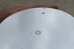 Cleaning mirrors, very carefully