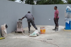 Preparing the flloor of the observatory for sealant