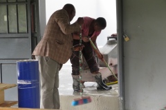 Preparing the flloor of the observatory for sealant