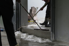 Preparing the flloor of the observatory for sealant